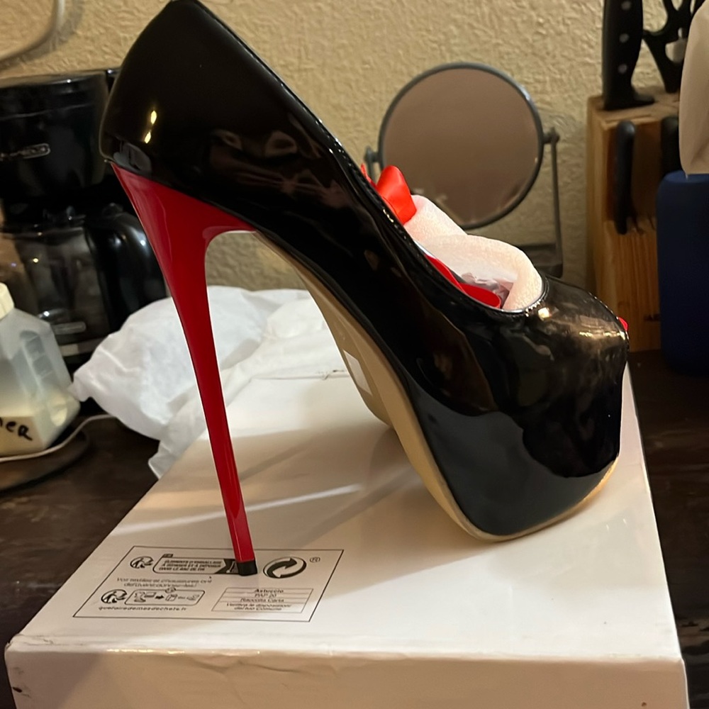 Black & red high heels with red ribbon that ties up your leg.